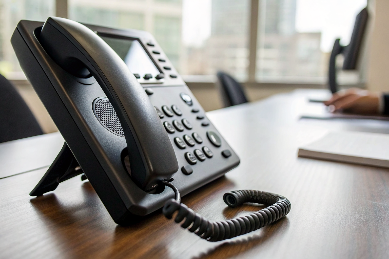 Office phone ringing with timer showing different seconds.
