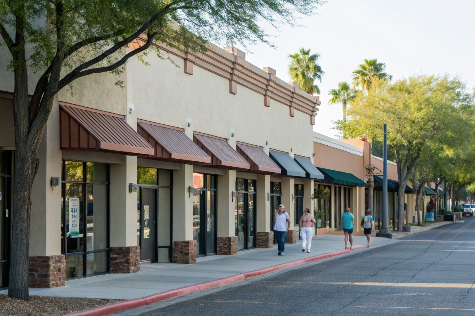 Row of med-spas in Scottsdale with clients entering and exiting.